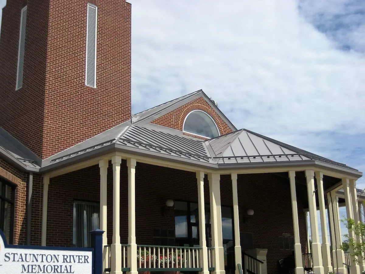 Skilled roofing craftsmen working on a residential roof in Hamptonville
